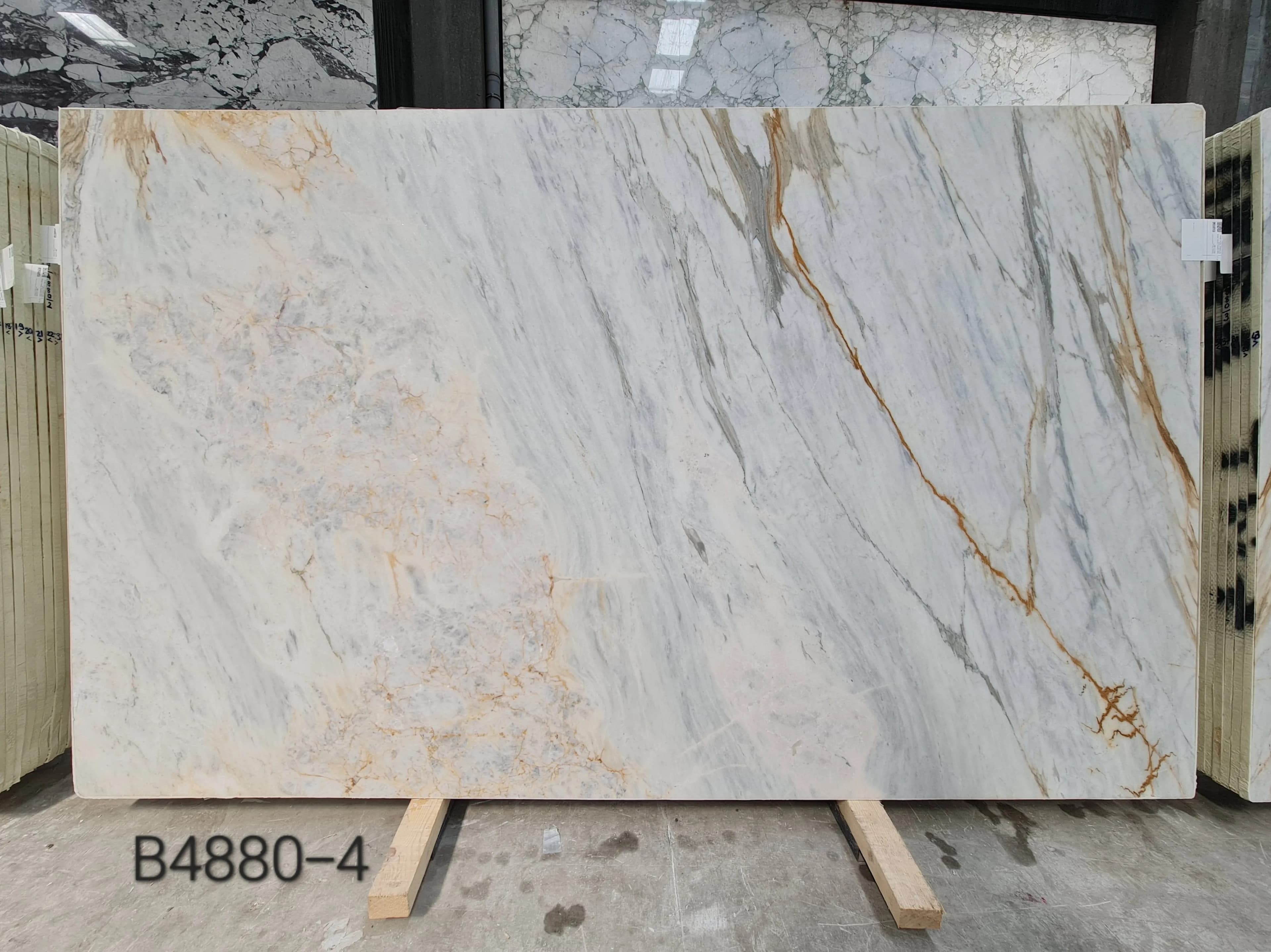 Calacatta Gold · Select
